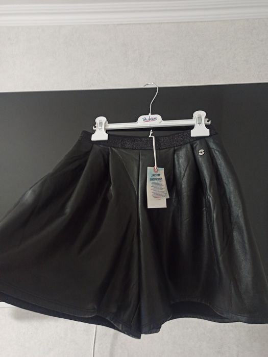 Шорти шкіряні бермути ,размір м