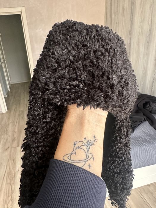 Жіноча шапка вушанка