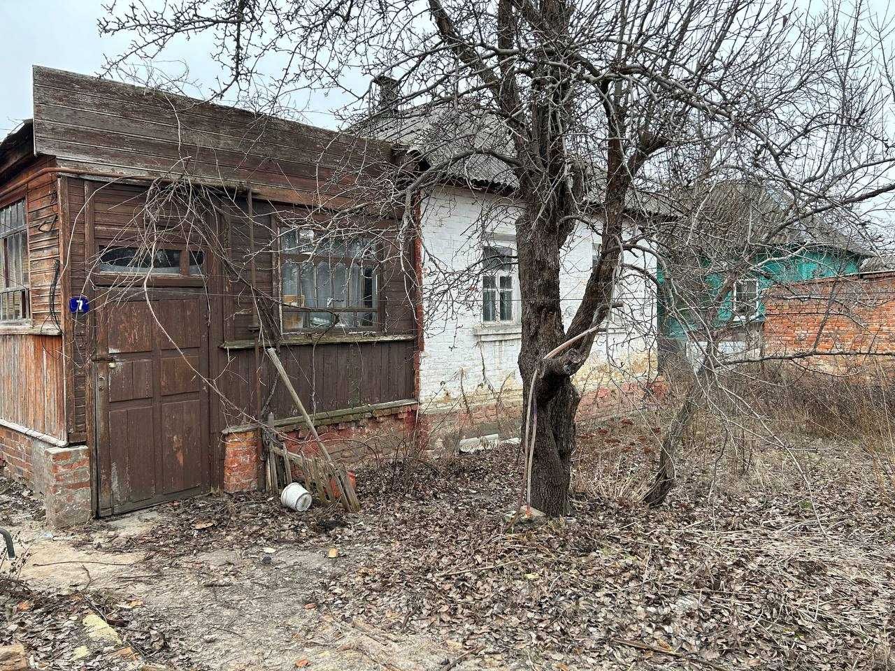 Продам земельну ділянку з будинком, в центрі міста