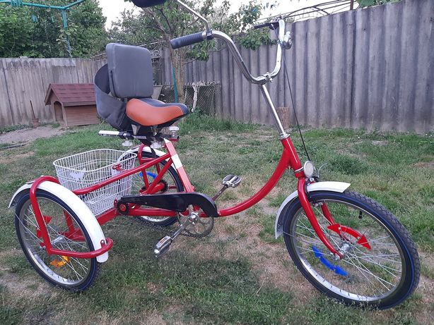 Дитячий велосипед для інвалідів.