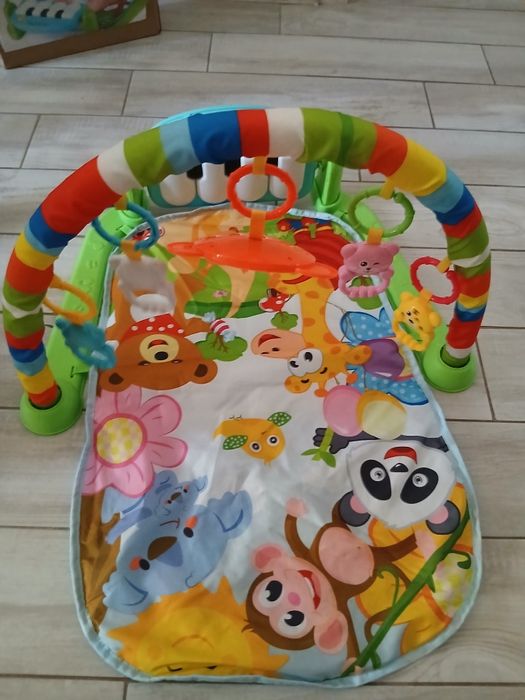 Розвиваючий килимок з піаніно.