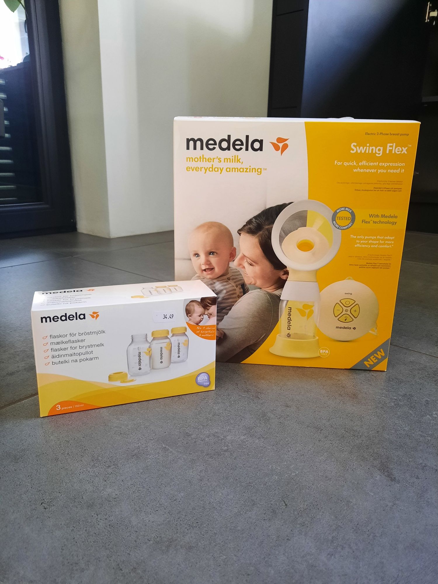 Laktator Medela Swing Flex + 3 butelki Medela
