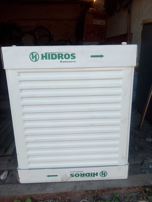 продам  новую  батарею  и   мойку  с краном  .