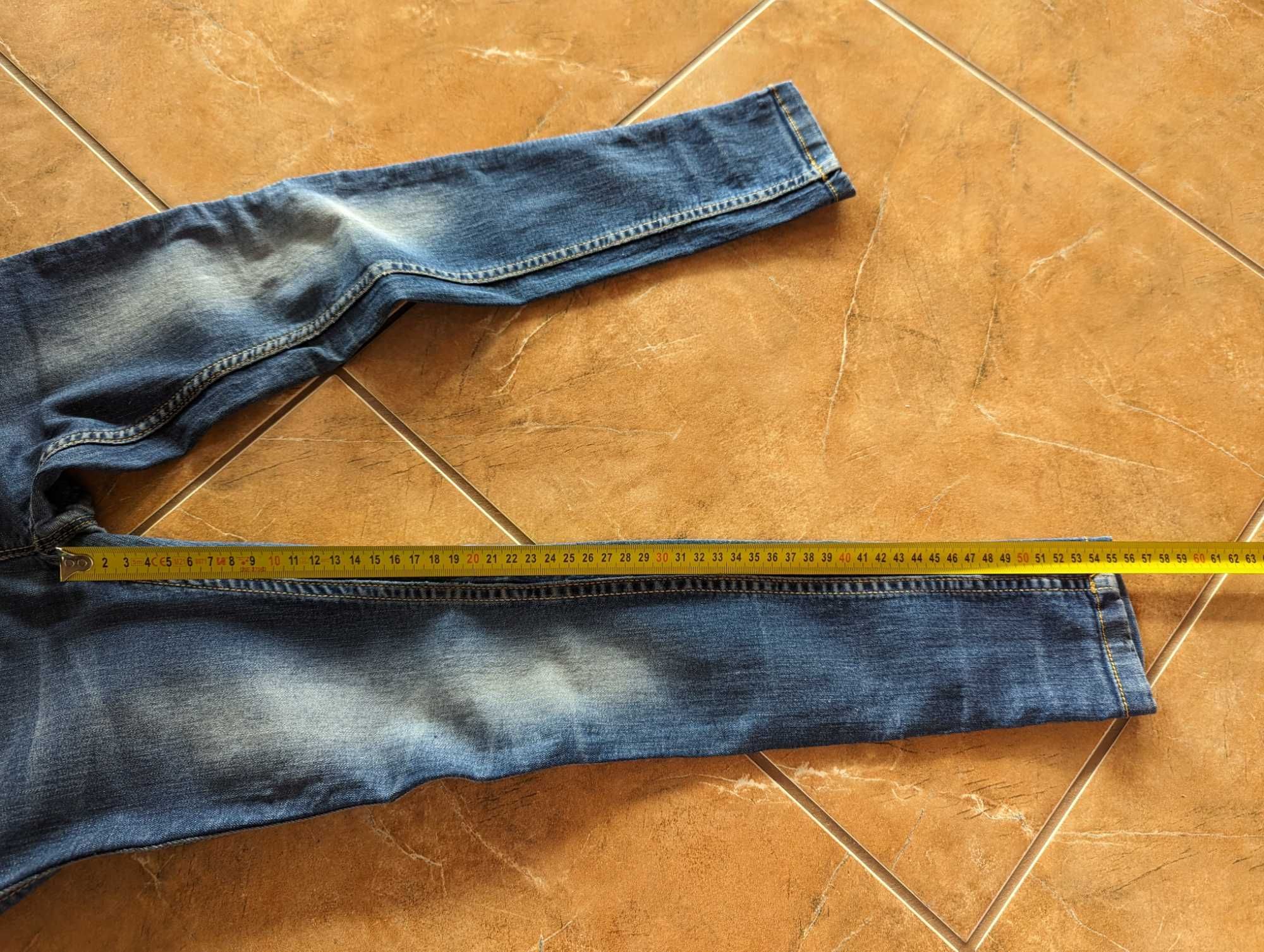 Spodnie jeansowe r. 134