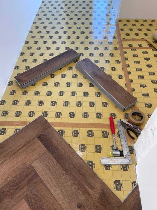 Укладка  кварцвініл ламінат spc Вирівнювання підлоги