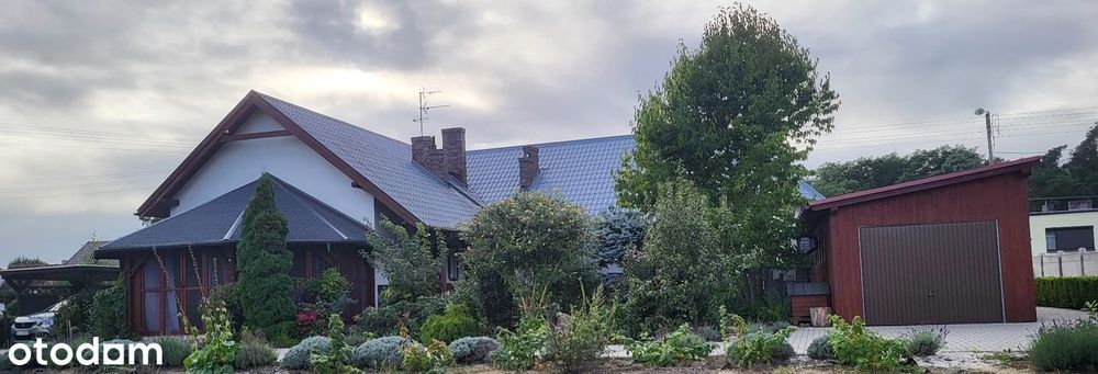 Dom w Śmiłowie k. Ponieca z lok. usług. i garaż. w bardzo dobr. stanie