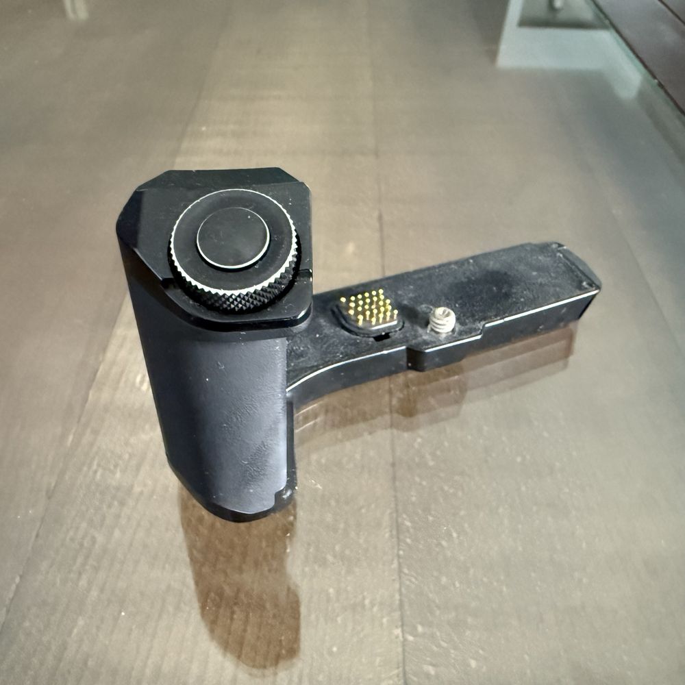 Punho Olympus HLD-8G