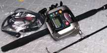 Conjunto cana e Carreto elétrico Daiwa TANACOM GS 60H,ótimo estado.