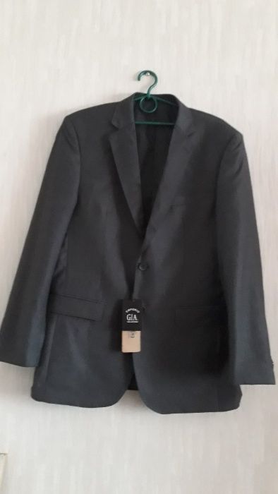 Продам новый мужской костюм 50-52 размера