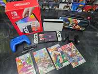 Nintendo Switch OLED + pokrowiec 4 gry 2 pady Gwar 12 mc SKLEP ZAMIANA