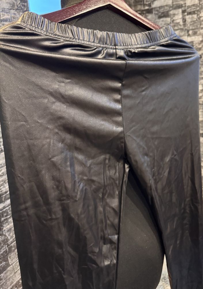 Czarne błyszczące legginsy L Cleve nowe