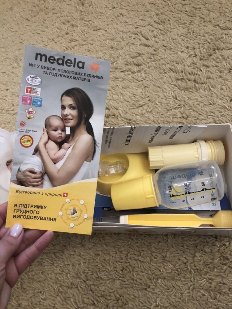 Молокоотсос Medela