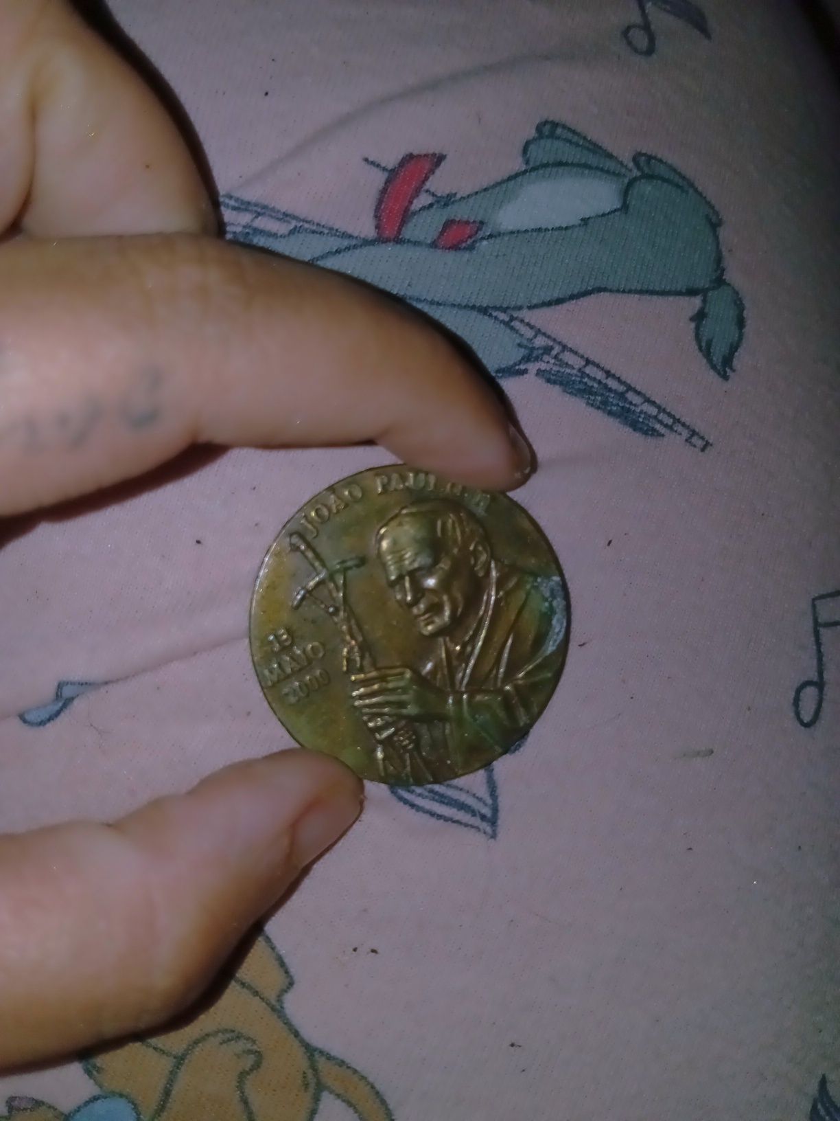 Pequena medalha João Paulo sengudo data na totk