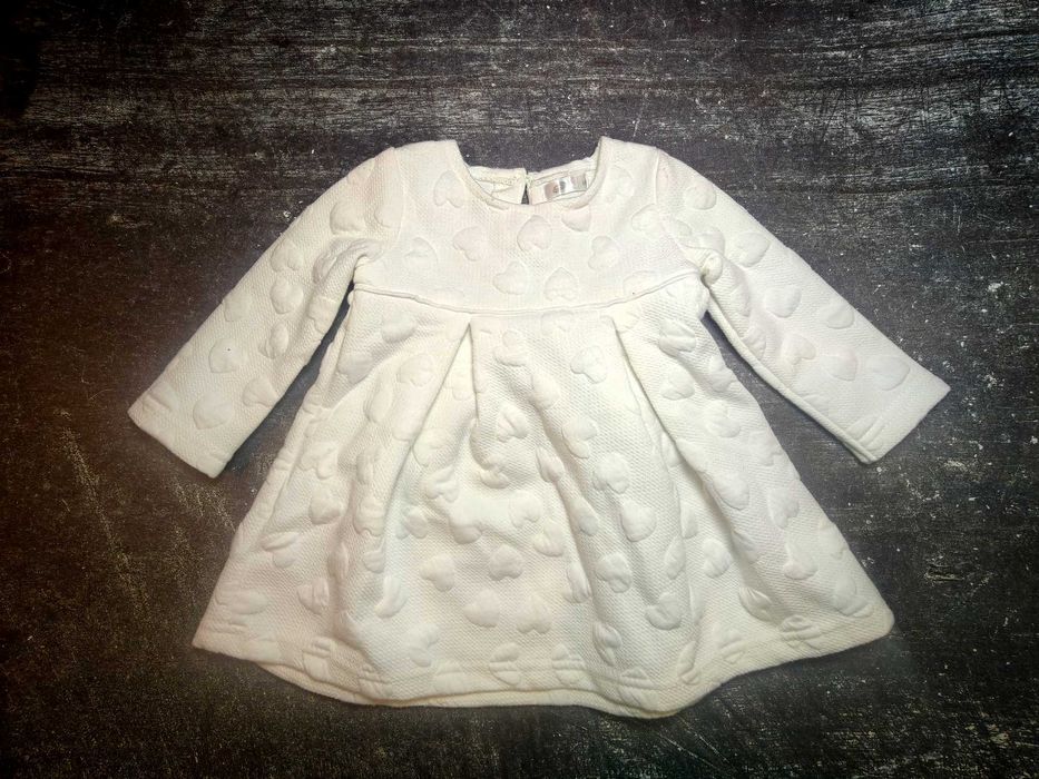 Śmietankowa niemowlęca sukienka