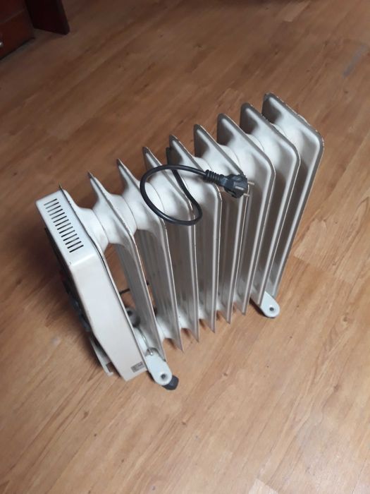 Aquecedores eletricos a oleo  em perfeito estado de funcionamento