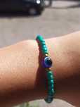 Pulseira com olho grego