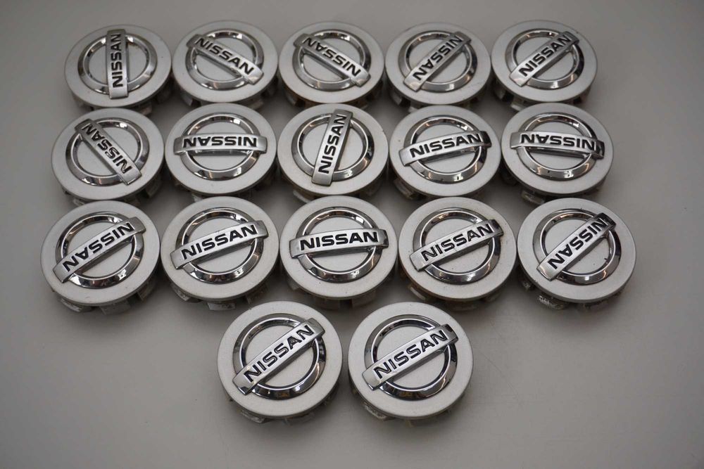 Dekielki oryginał Nissan OE 54mm 40342 AV610 srebrne 4sztuki