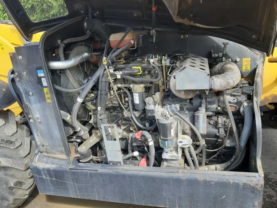 Ladowarka teleskopowa Caterpillar TH407C 2015, 6400mtg