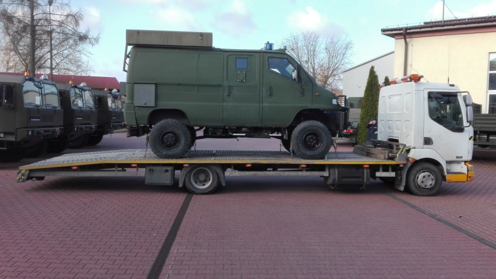 pomoc drogowa laweta transport koparka bus widlak przyczepa kontener