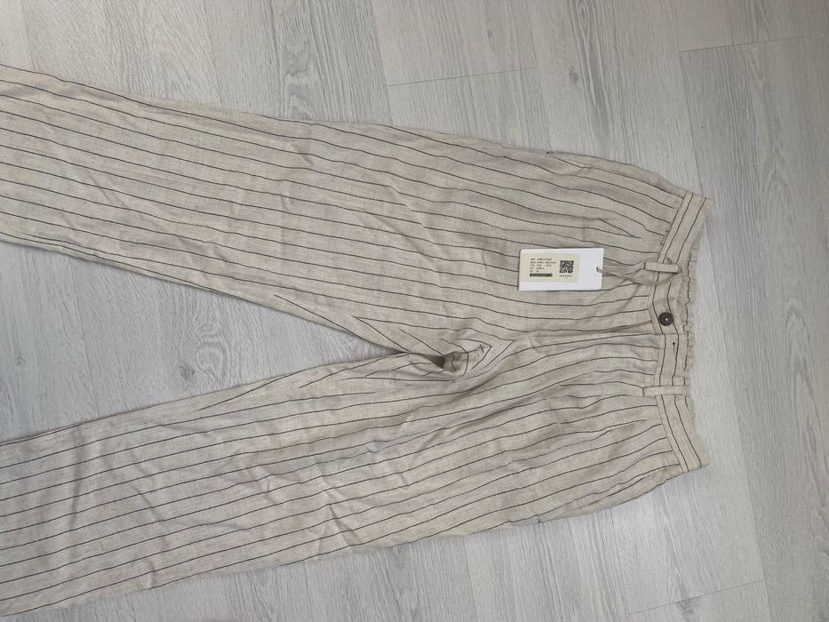 Чудові лляні брюки ьежевого та чорного кольрів