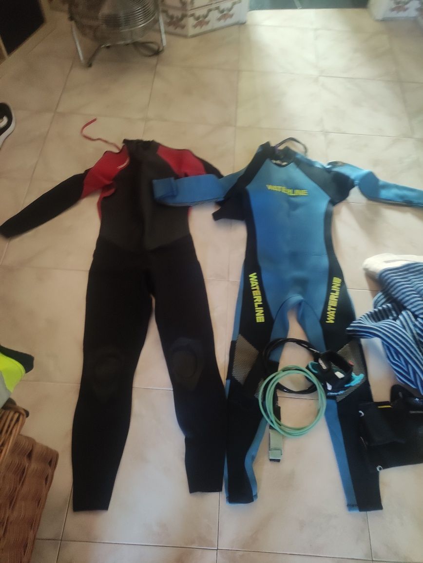 Pranchas surf  branca e amarela mais dois fatos  e capa de pano