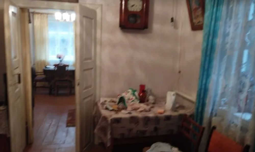 "1/2 частина будинку   з ділянкою і гаражем