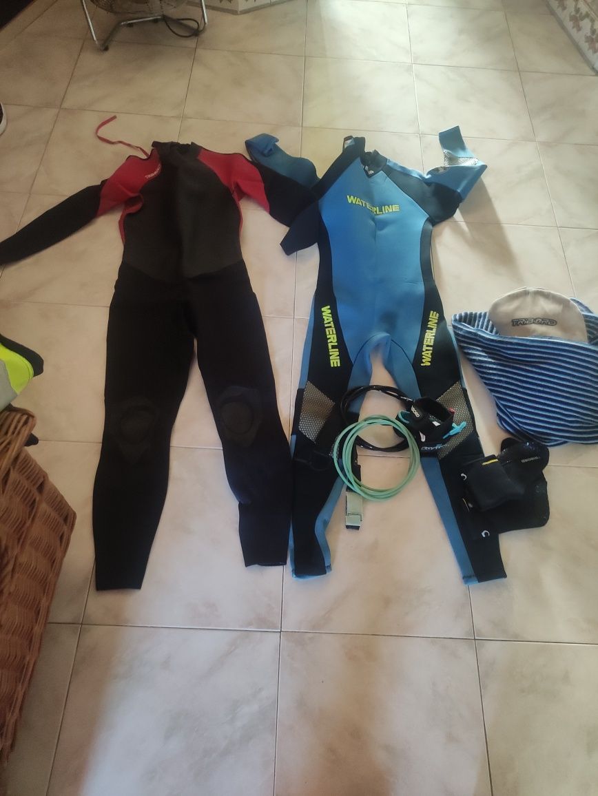 Pranchas surf  branca e amarela mais dois fatos  e capa de pano