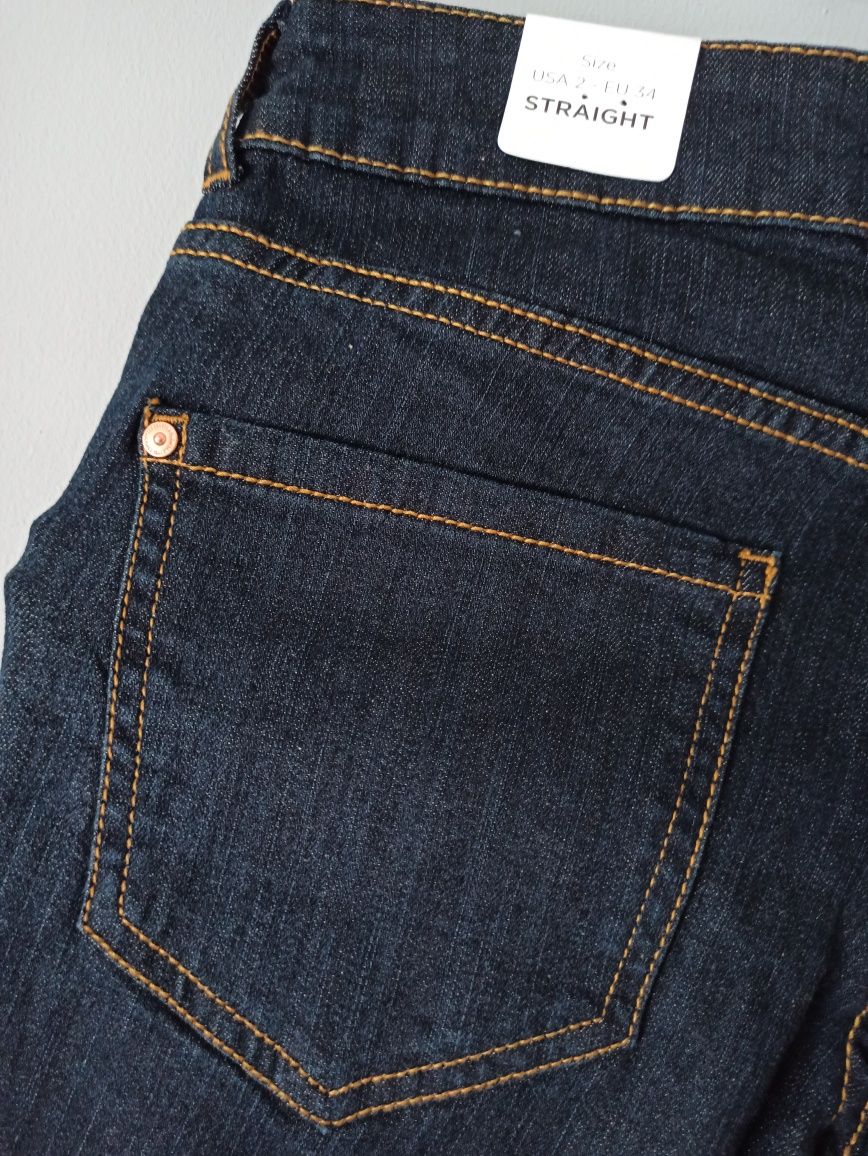 Nowe spodnie jeansowe Mango r34