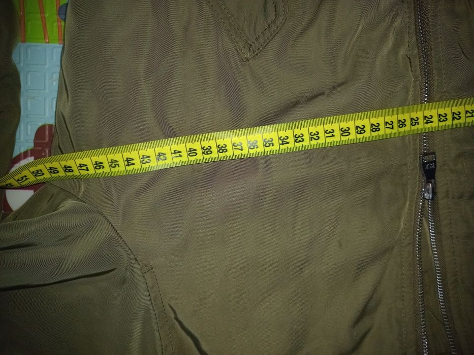 Жіноча осіння куртка  44