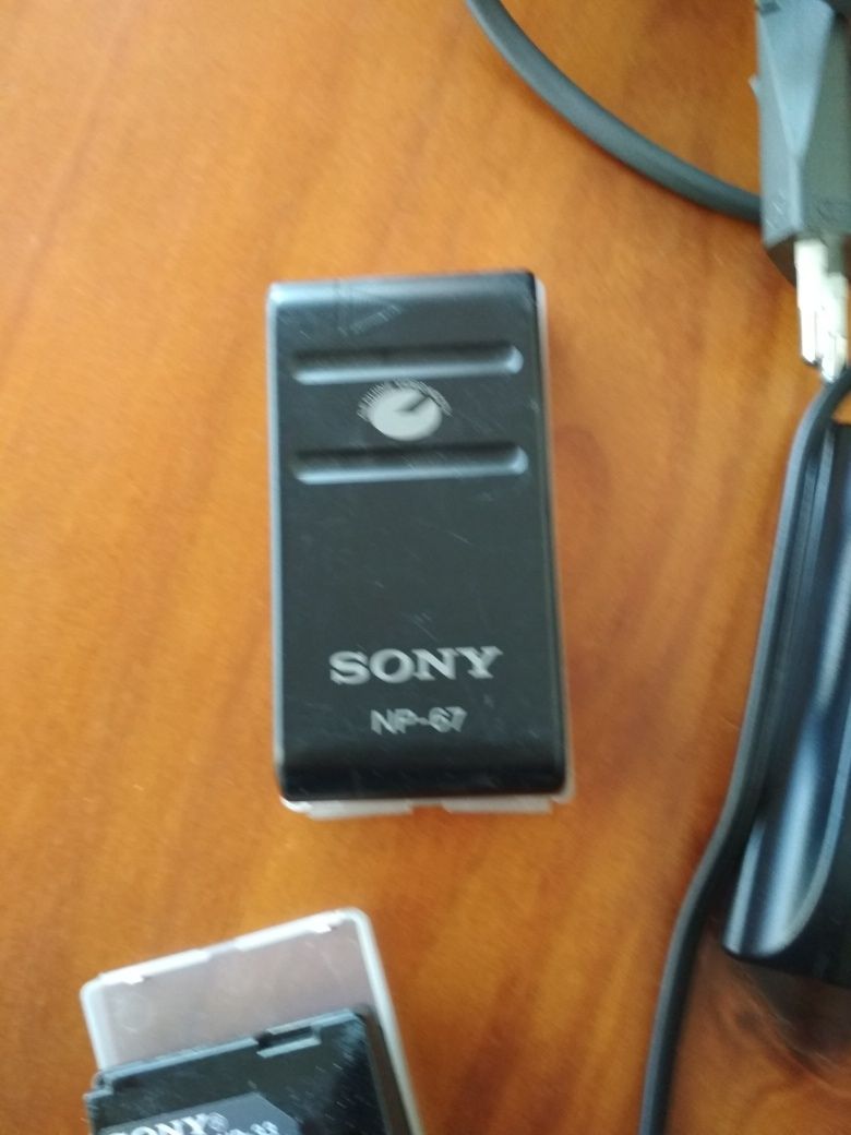 Carregador Sony com baterias