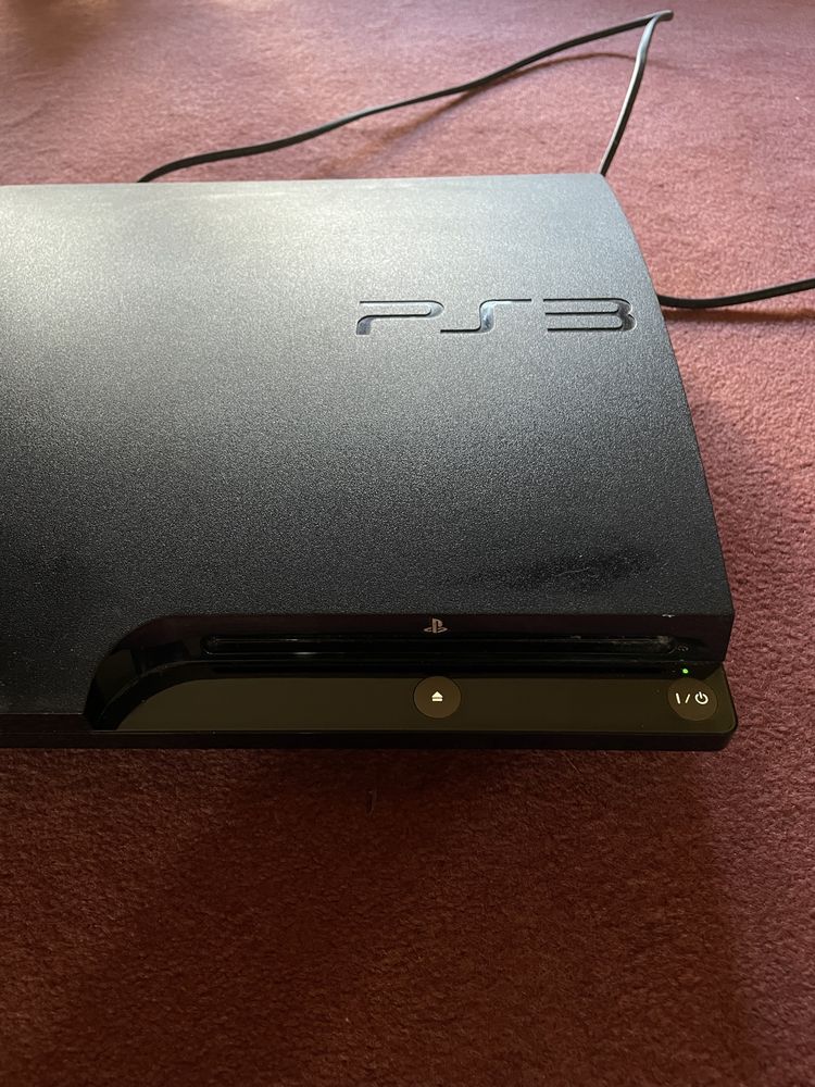 Vendo PS3 Slim + comandos + jogos