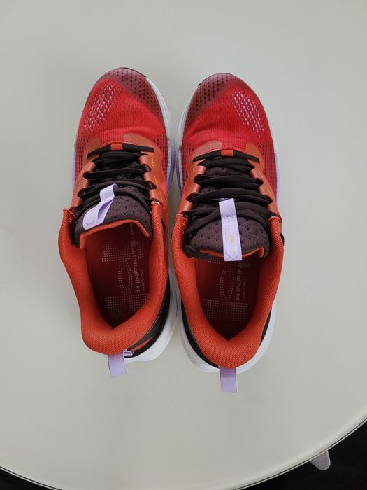 Buty Under Armour UA U Infinite Pro Trail - pomarańczowe 42.5