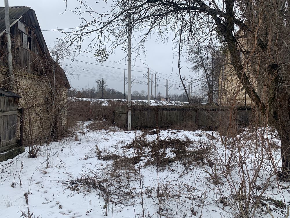 Ділянка в районі жд вокзалу. 10соток з будинком.