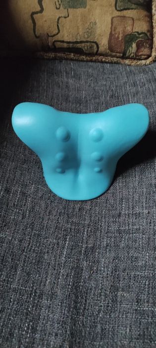 Масажна підставка для шиї