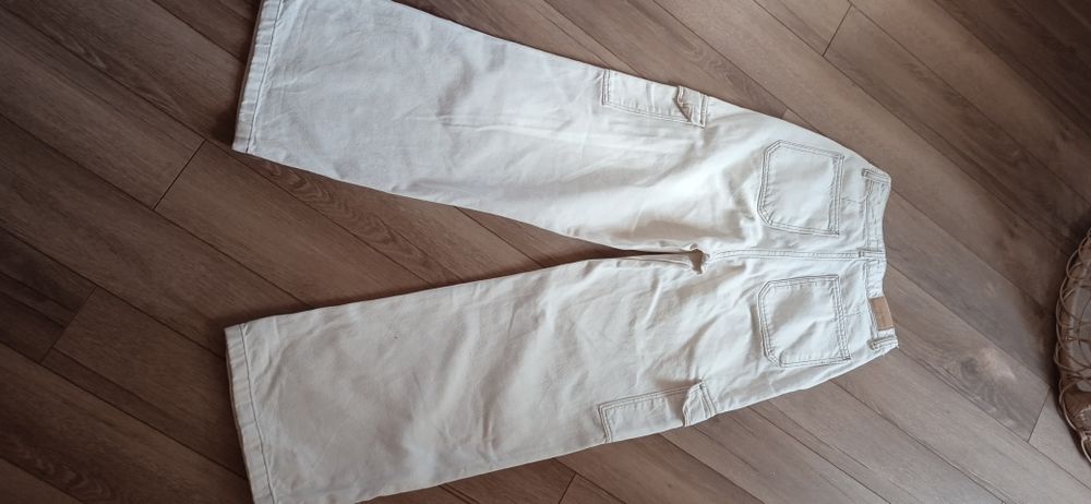 Джинси молочні жіночі