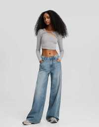 Hit sezonu .H&M szerokie nogawki  spodnie jeansy   creme x/s
