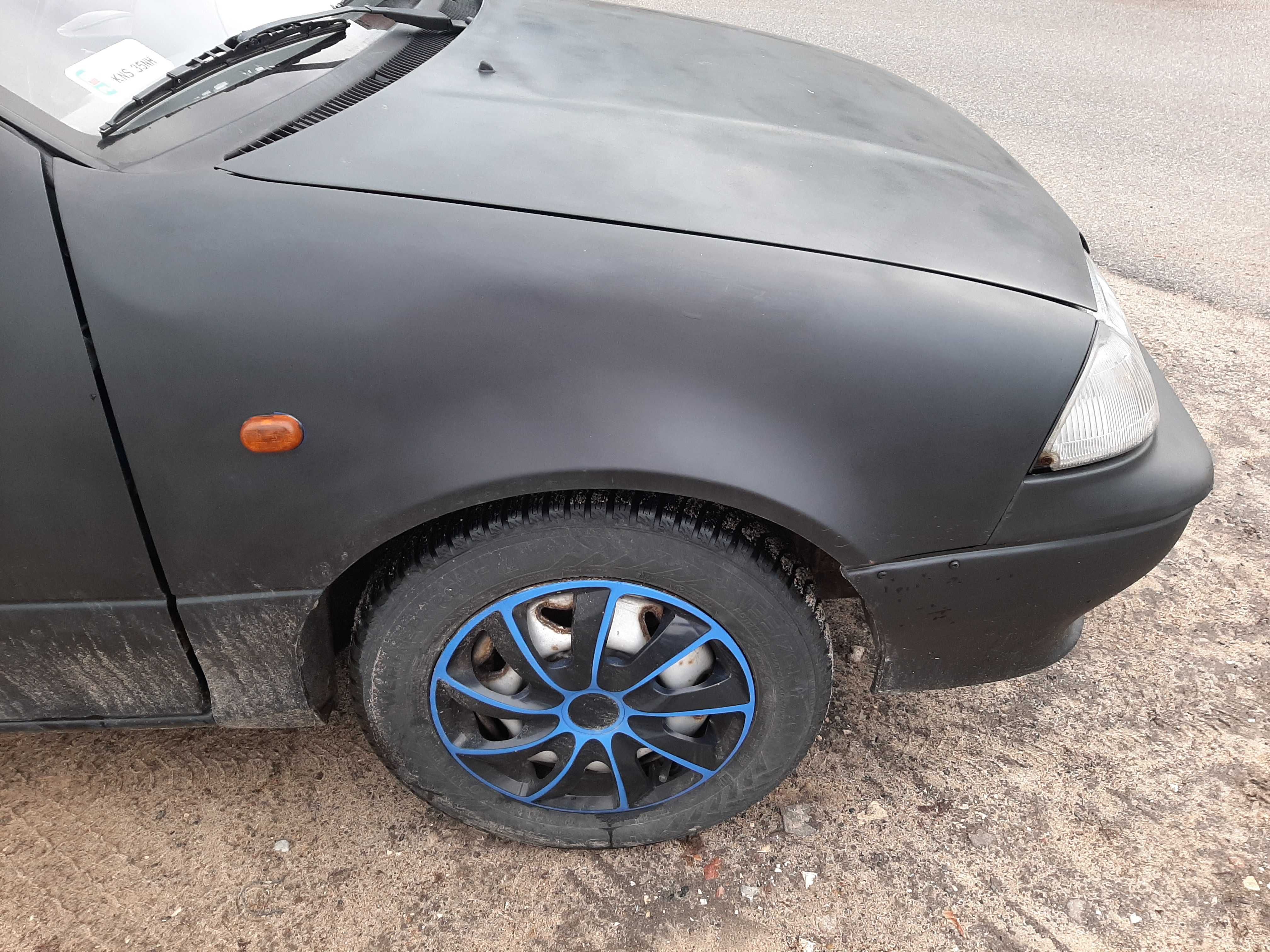 Suzuki Swift 1.0i 1996r.Błotnik przedni prawy