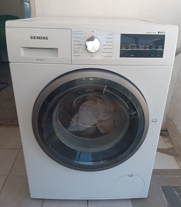 Máquina de lavar e secar