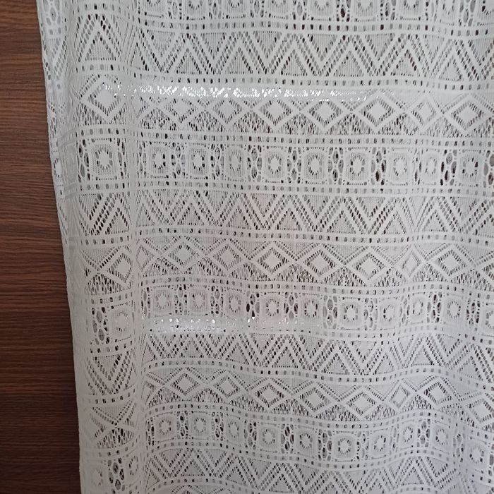 Прозора сукня на пляж.