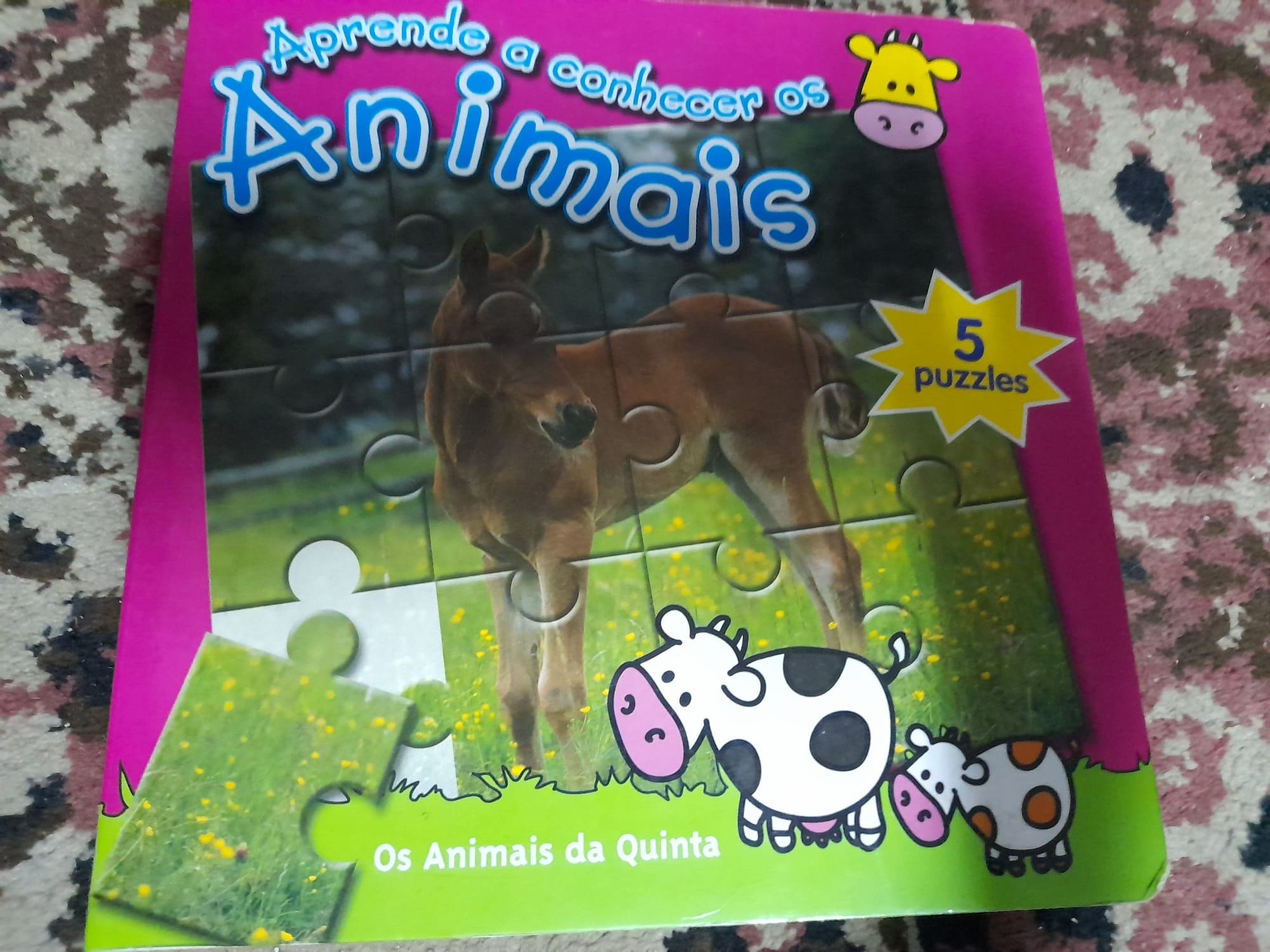 Livro de animais com puzzle