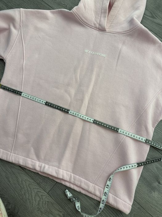 Рожеве худі.