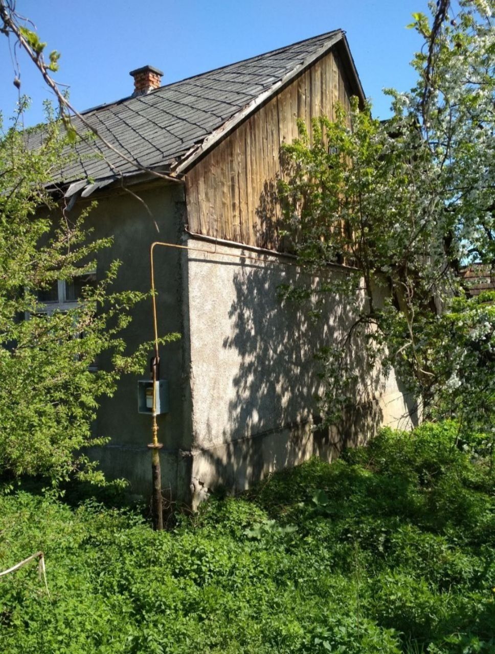 Продам земельну ділянку з будинком