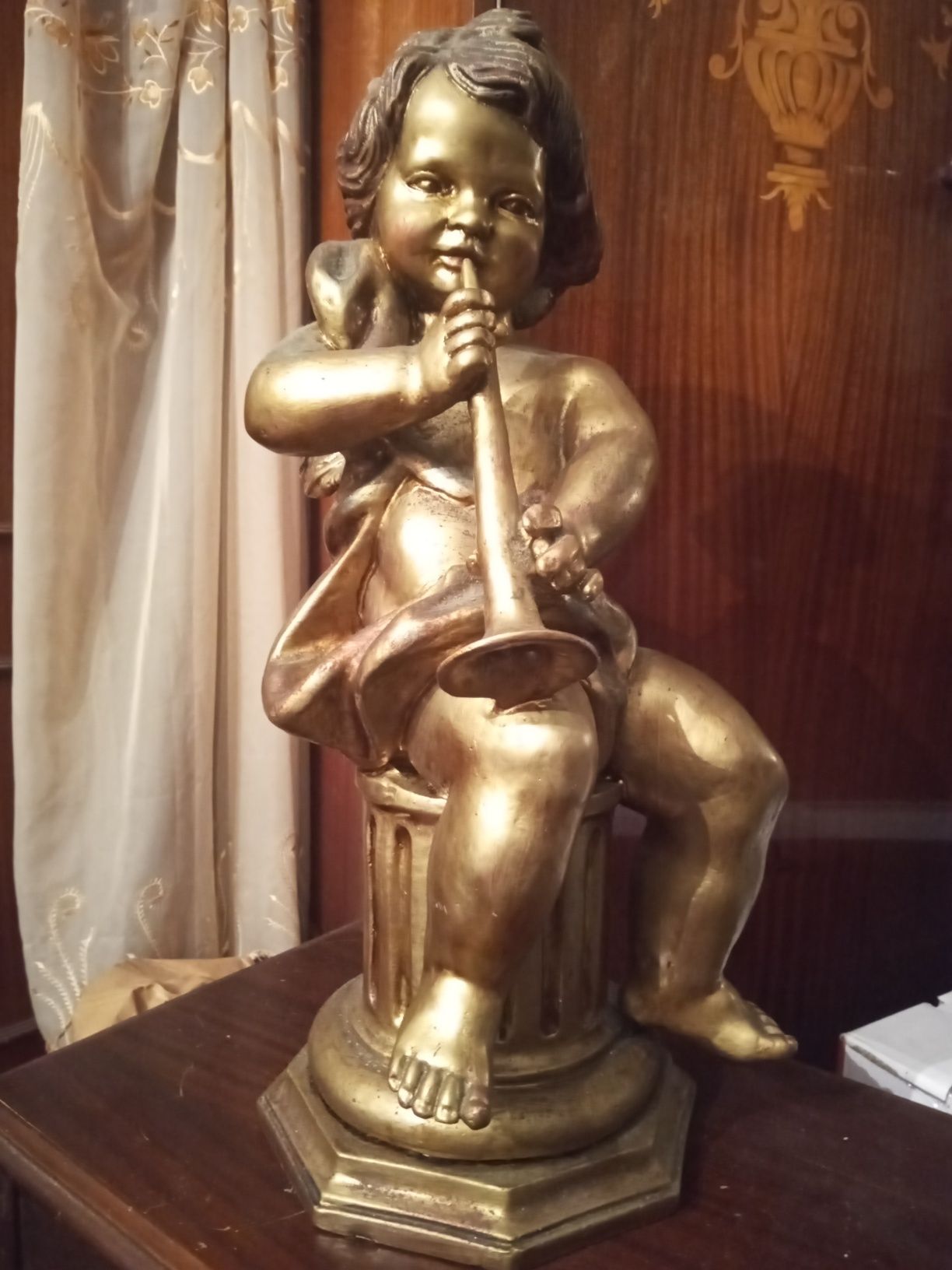 Linda figura em marfinite