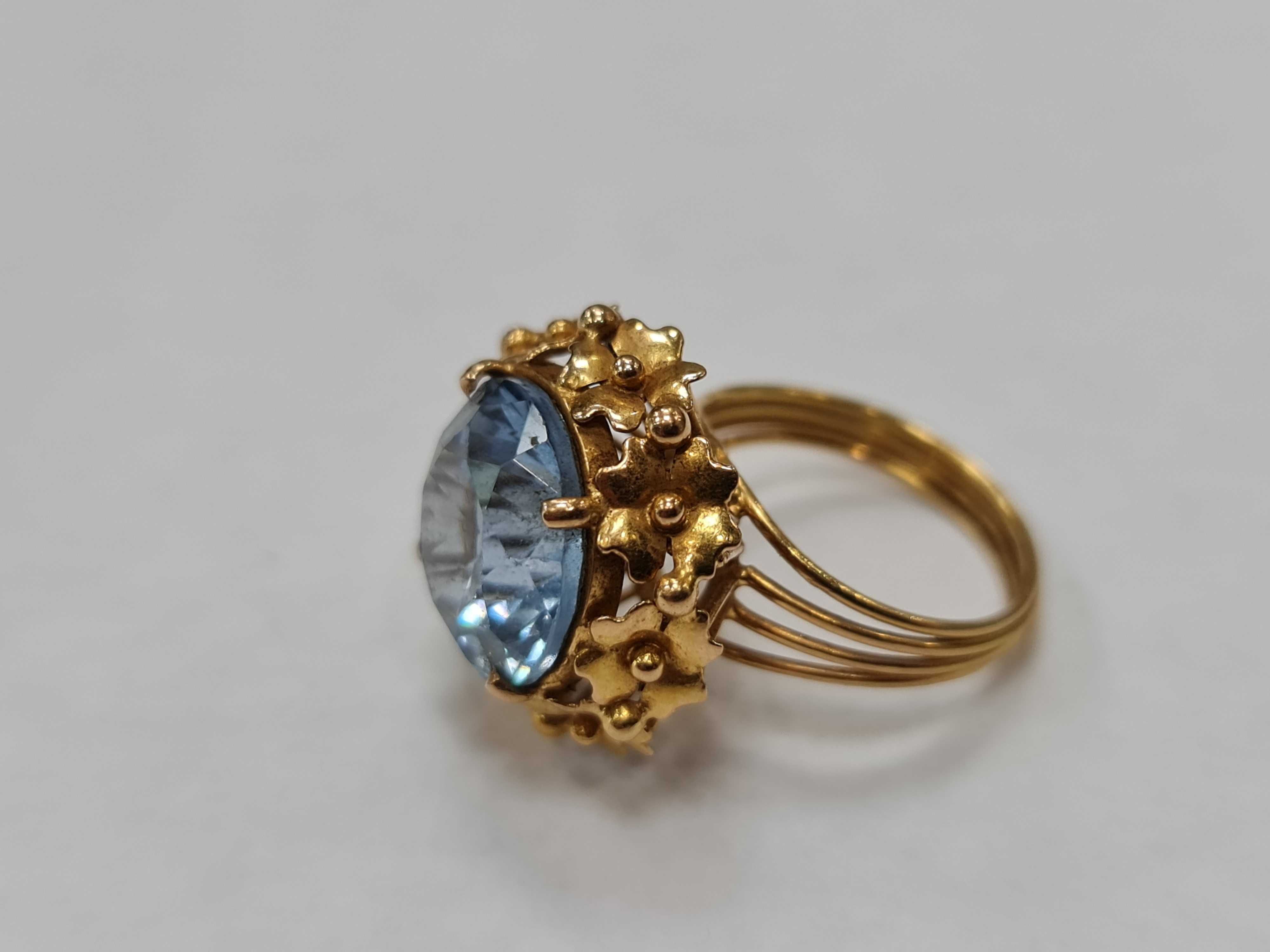 Wyjątkowy złoty pierścionek damski/ 750/ 7.48 gram/ R14/ Topaz