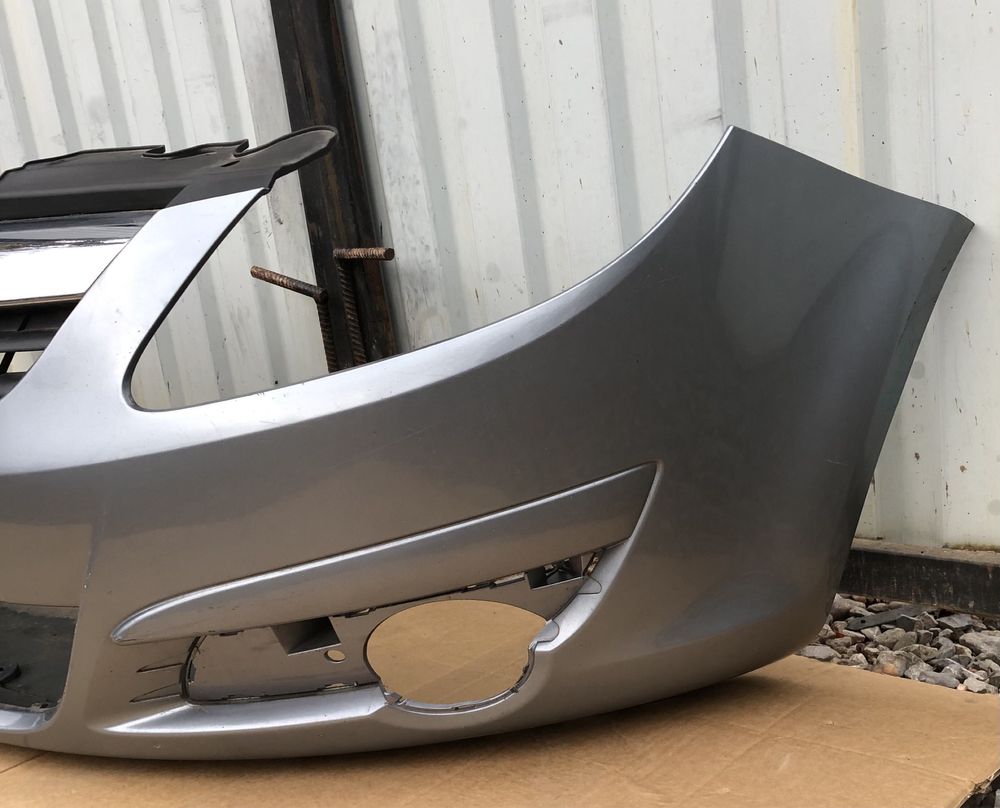 Бампер передній з решіткою радіатора Opel Corsa D 06-10р.