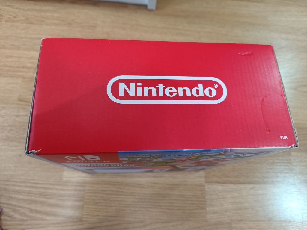 Nintendo Switch (OLED model) White + Гра Super Smash Bros. Ultimate (