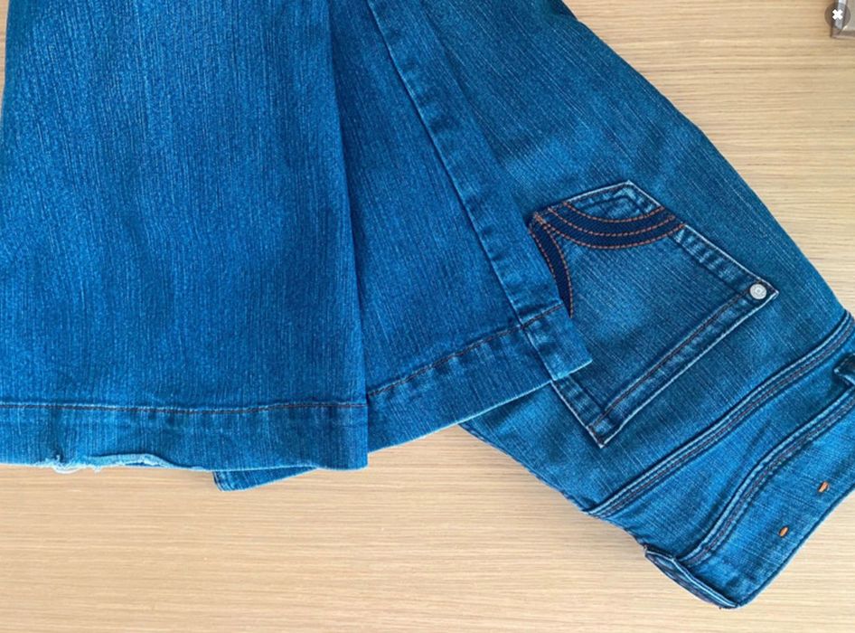 Niebieskie dżinsy - jeansy - flare - dzwony rozm 36
