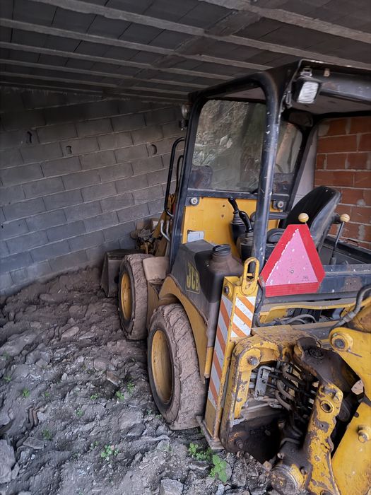 JCB CX1 de 2005 em bom estado
