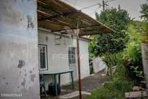 Moradia T1 com Quintal e Edifício de Arrumos