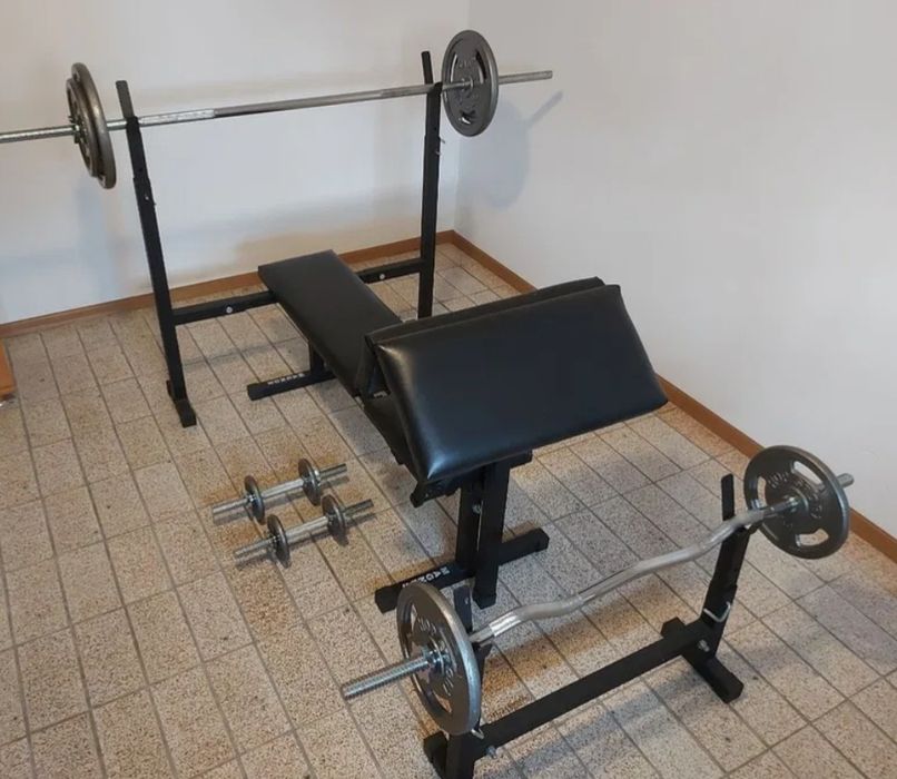 Siłownia Magnus: obciążenie żeliwne, ławka, sztangi, hantle, modlitewn
